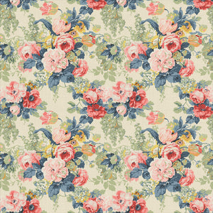 Printed linen fabric with bouquets of roses in gentle pinks and reds.