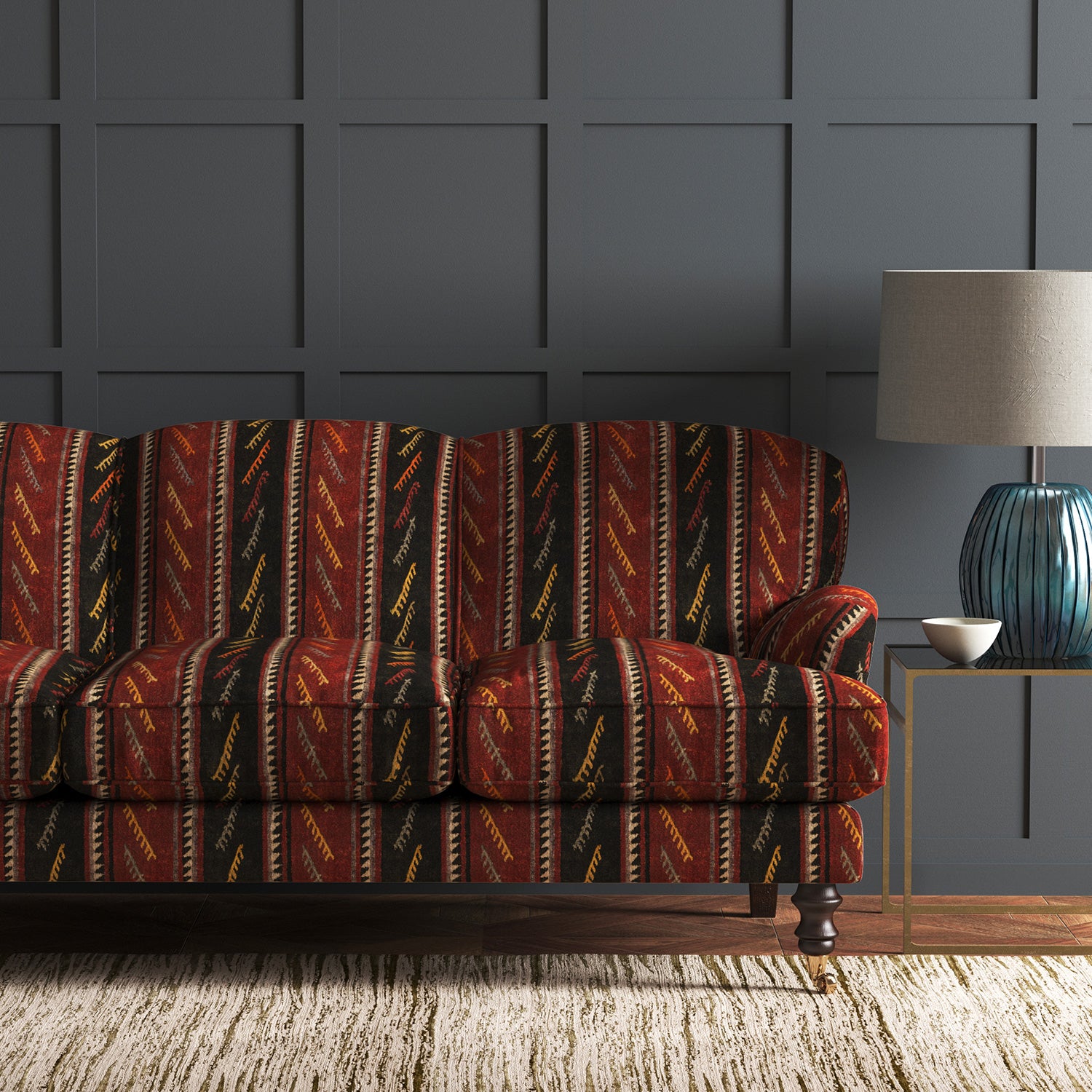 Velvet sofa in a striped velvet fabric in dark red and brown colours with a stain resistant finish