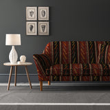 Velvet sofa in a striped velvet fabric in dark red and brown colours with a stain resistant finish
