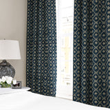 Linen curtain with a hand block-style pattern in blue, black and cream