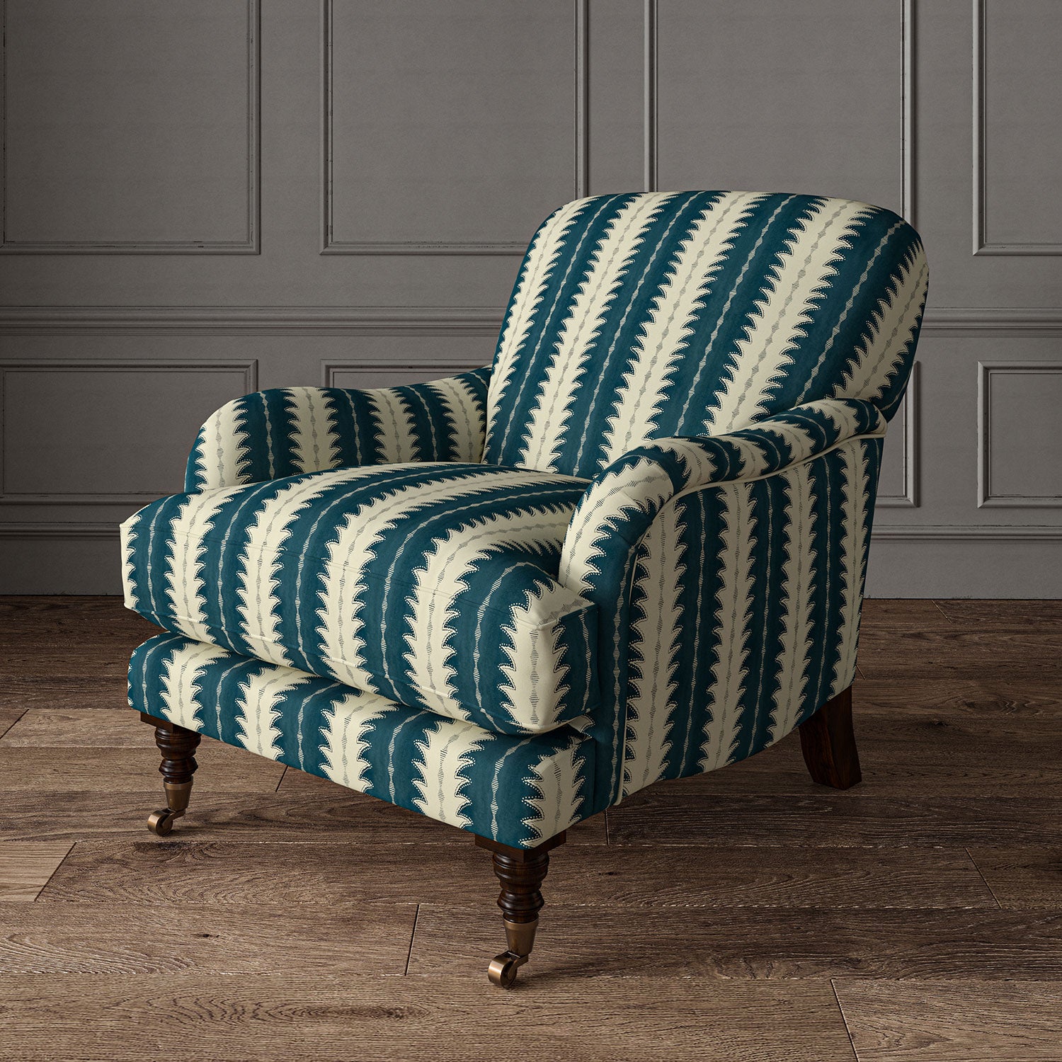 Armchair upholstered in a printed linen fabric in blue and off white, featuring a striped fern design.