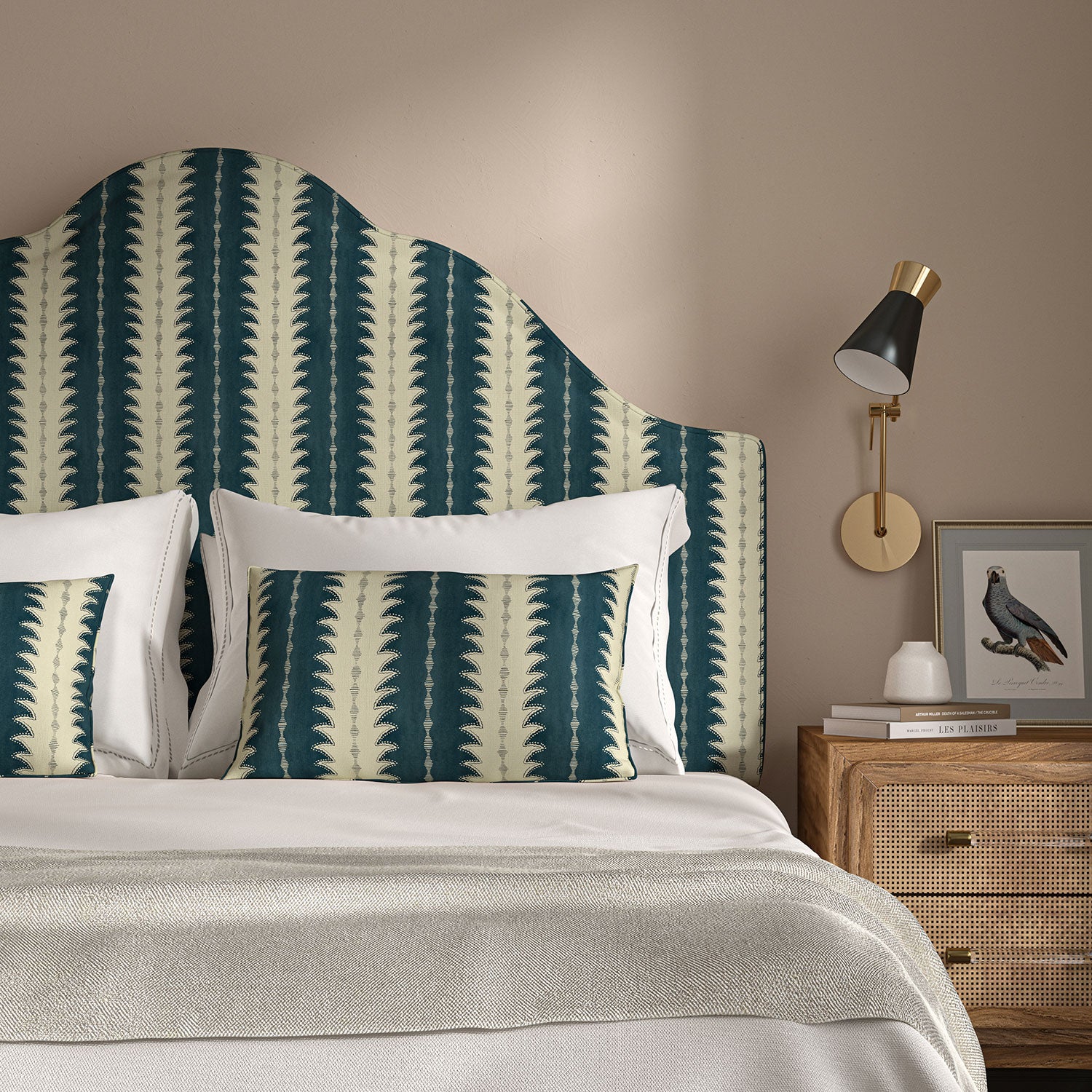 Headboard upholstered in a printed linen fabric in blue and off white, featuring a striped fern design.