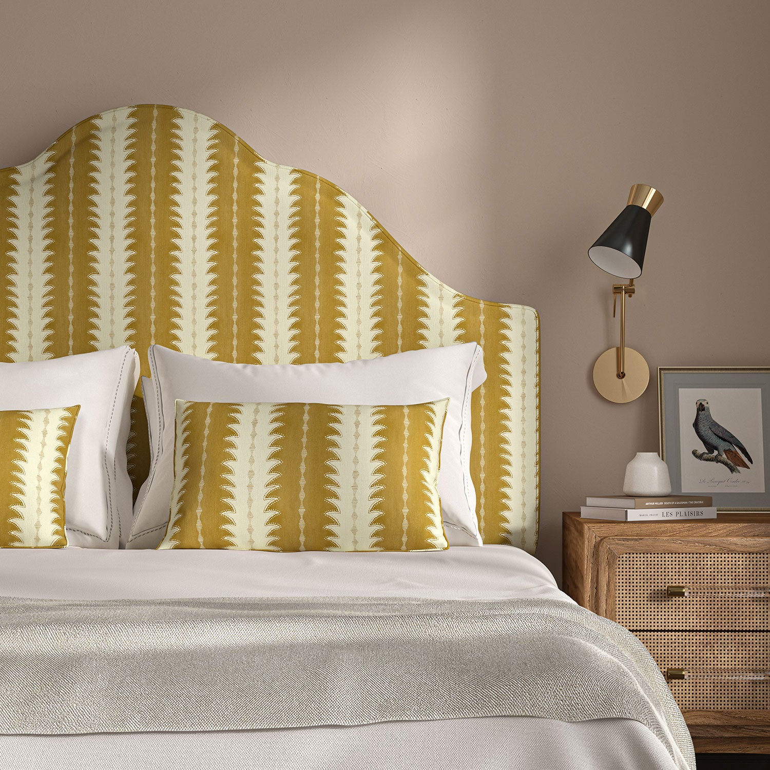 Headboard upholstered in a printed linen fabric in yellow and off white, featuring a striped fern design.