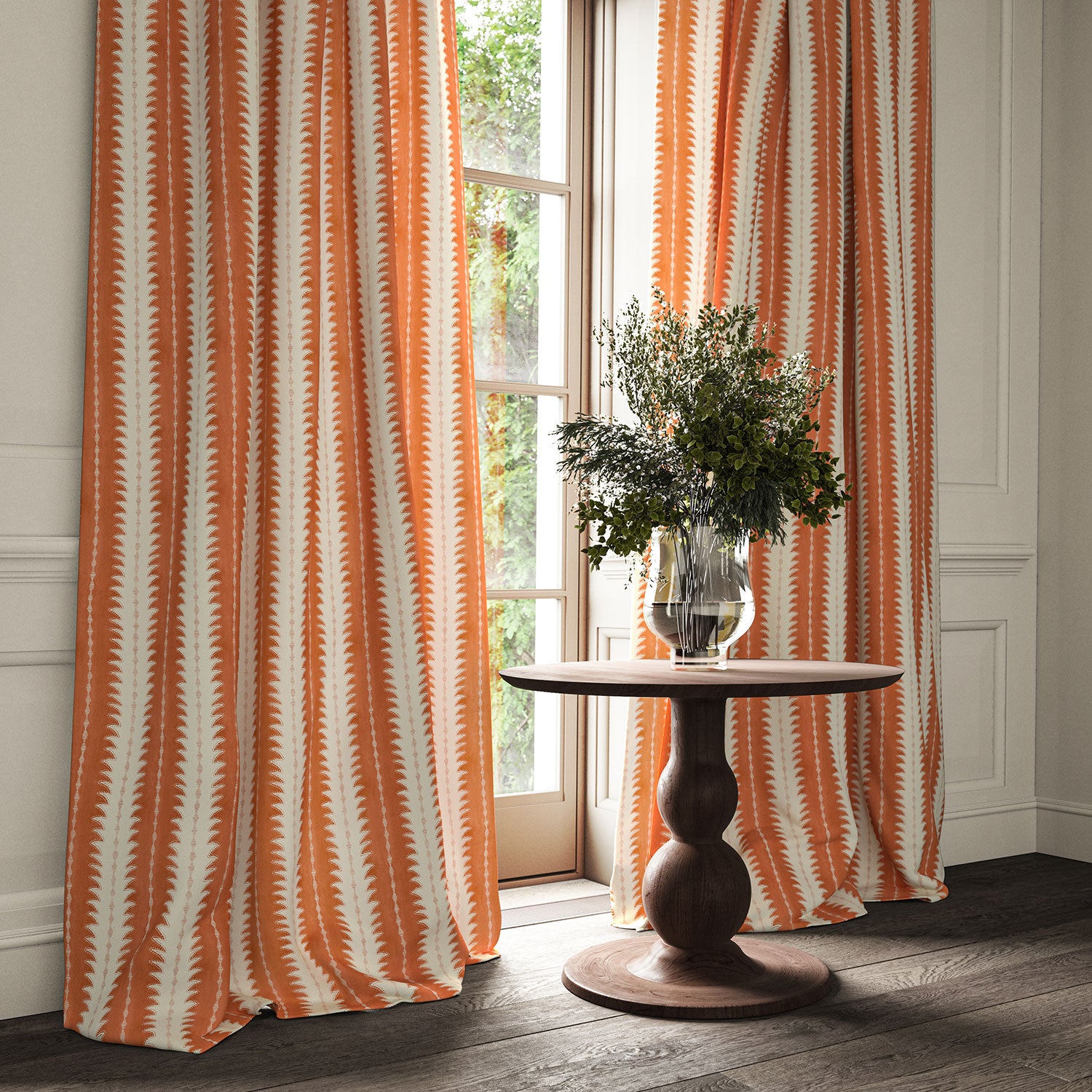 Curtains made from a printed linen fabric in orange and off white, featuring a striped fern design.