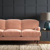 Pink eco velvet upholstery fabric on a sofa