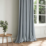 A blue woven fabric shown as a curtain.