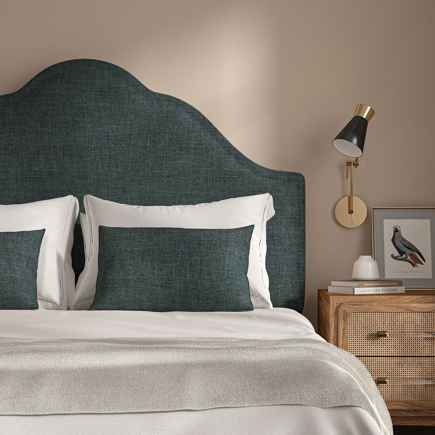 Blue headboard upholstered in a chenille woven fabric.