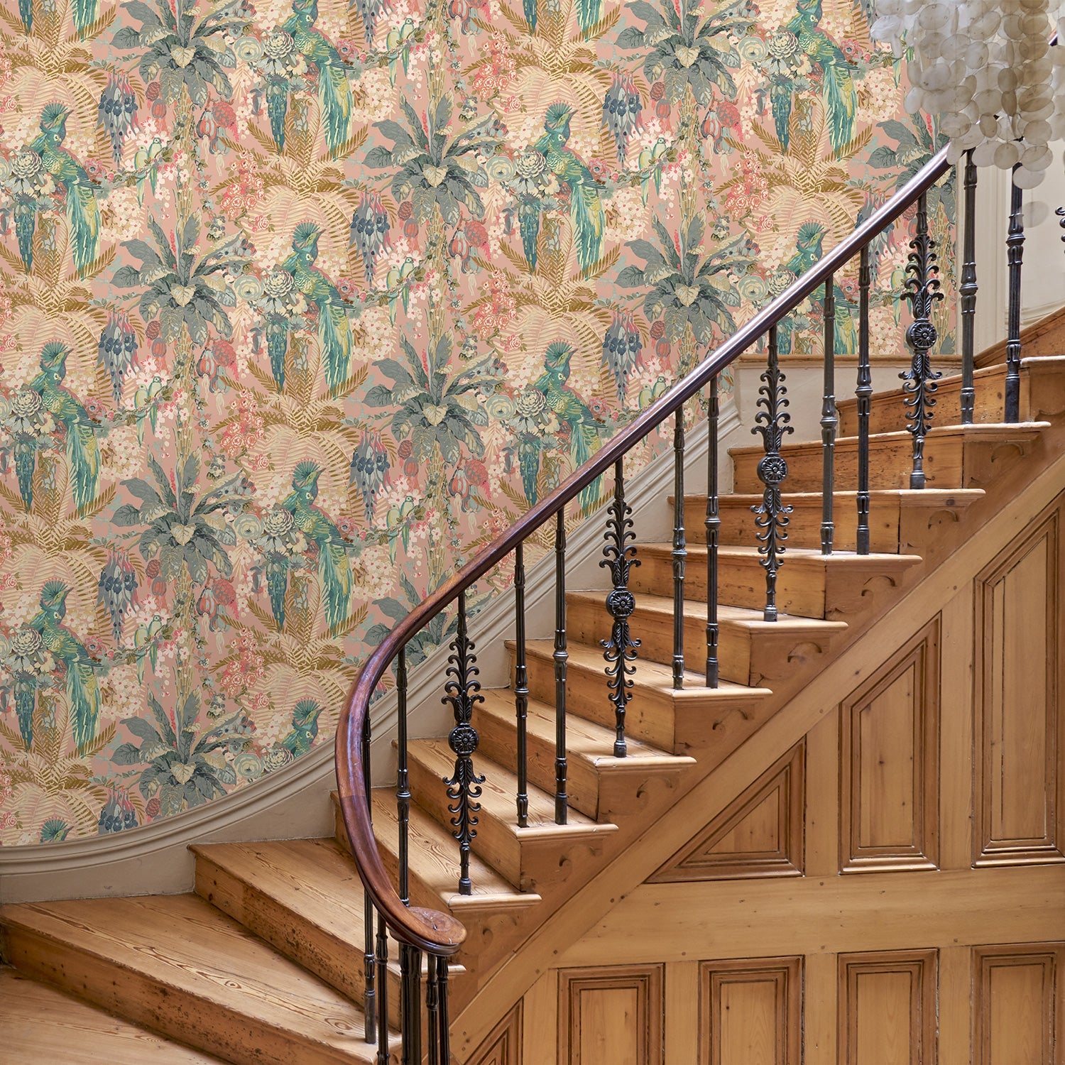 Tropical wallpaper in candy, shown in a hallway.
